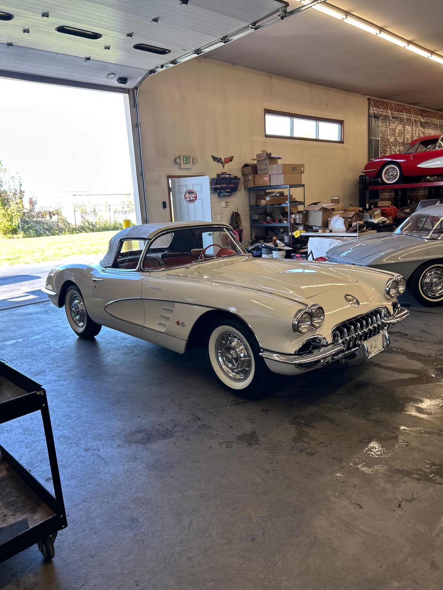 Classic white Corvette in the garage after detailing