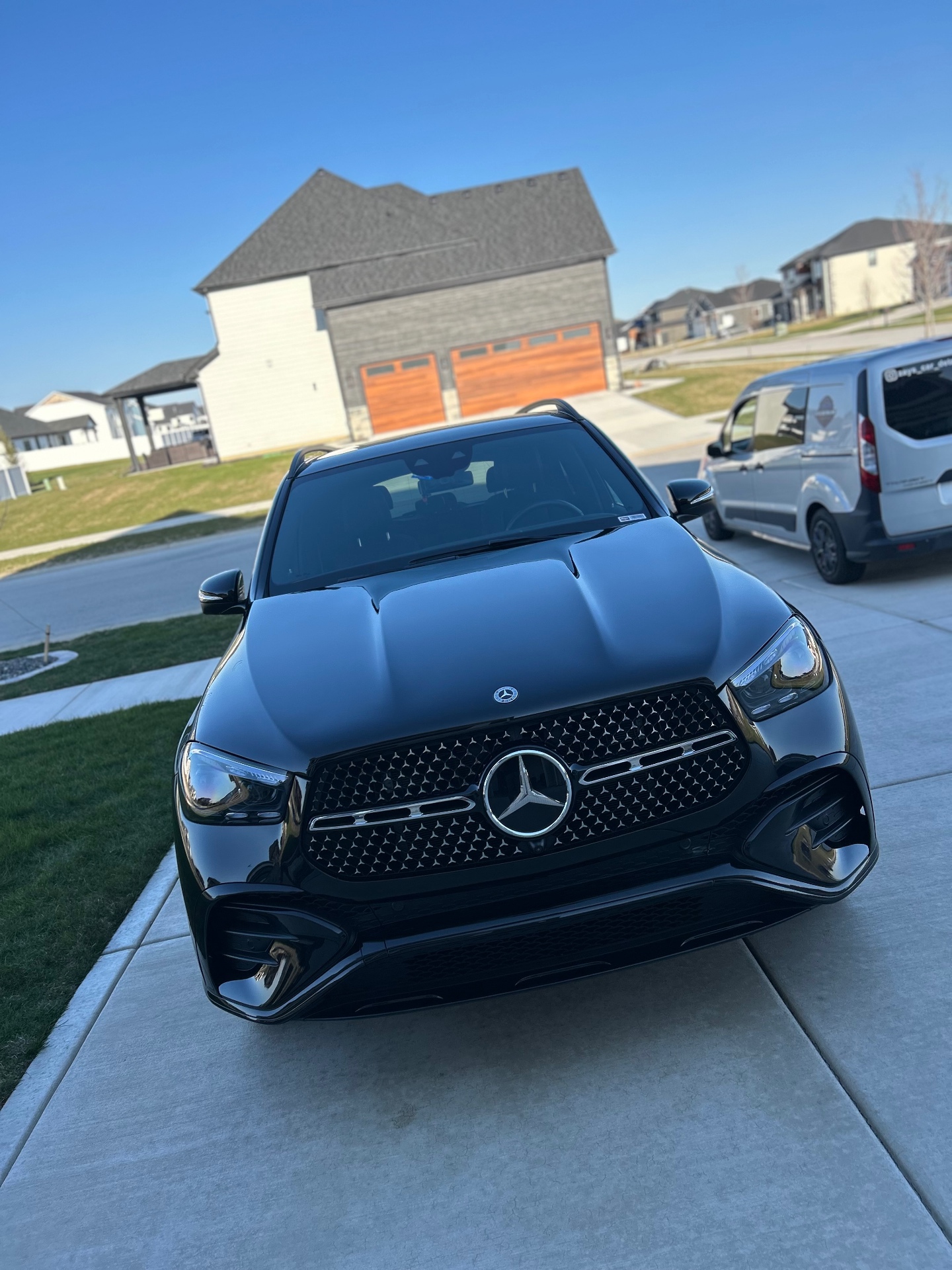 Black Mercedes SUV after exterior detail and gloss enhancement