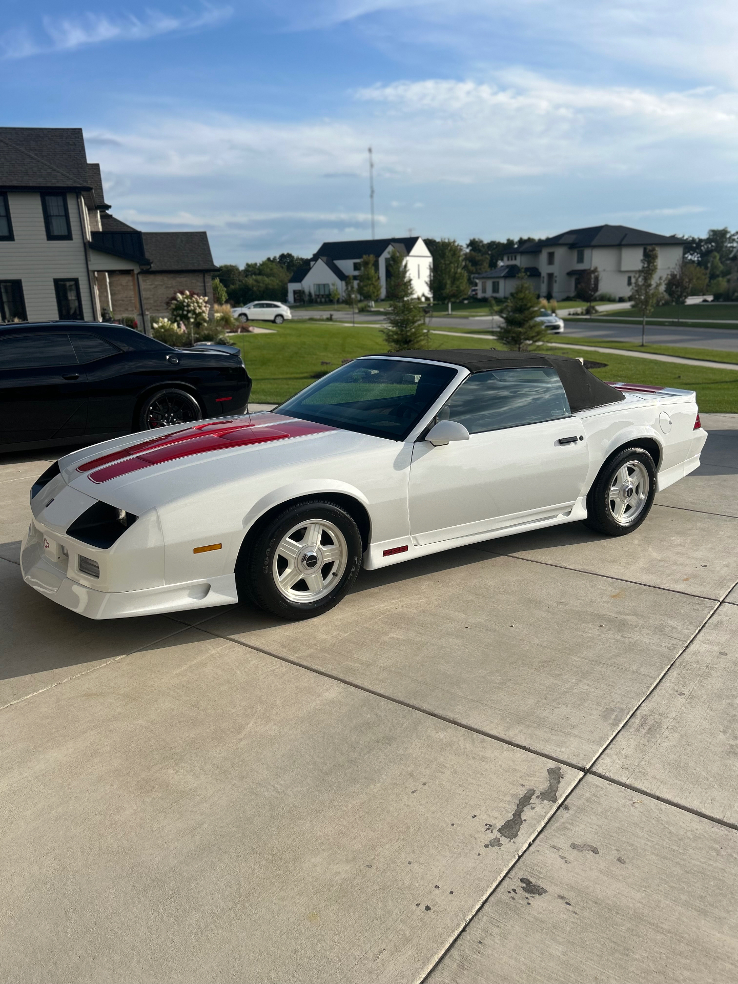 Classic white Chevy Camaro convertible after exterior detail