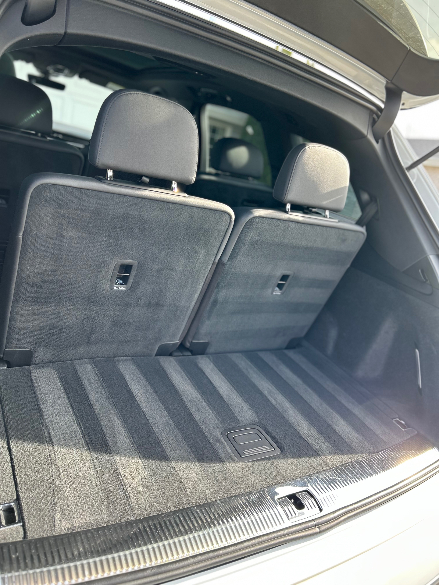 Interior trunk and rear seats after shampoo and vacuum